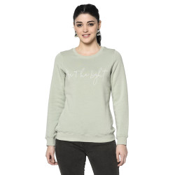 A cropped image of a woman wearing a Mint Green Sweatshirt with round neck and ribbed cuff designed for mild winter.